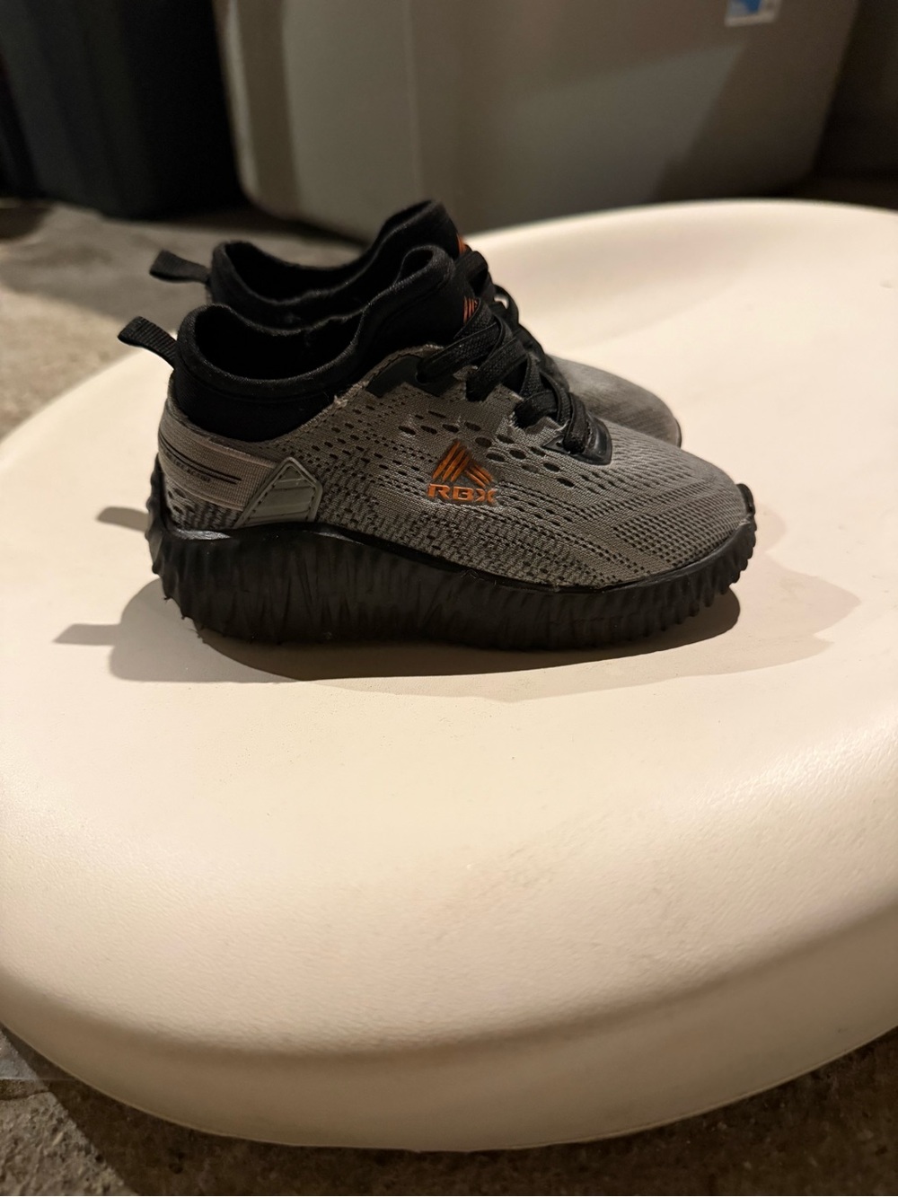 Kids Grey and Black Athletic Sneakers with Orange Logo